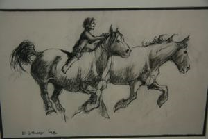 Image of Boy Riding Horse