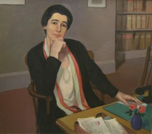 Image of Portrait of Librarian, Dorothy Strauss sitting at her desk